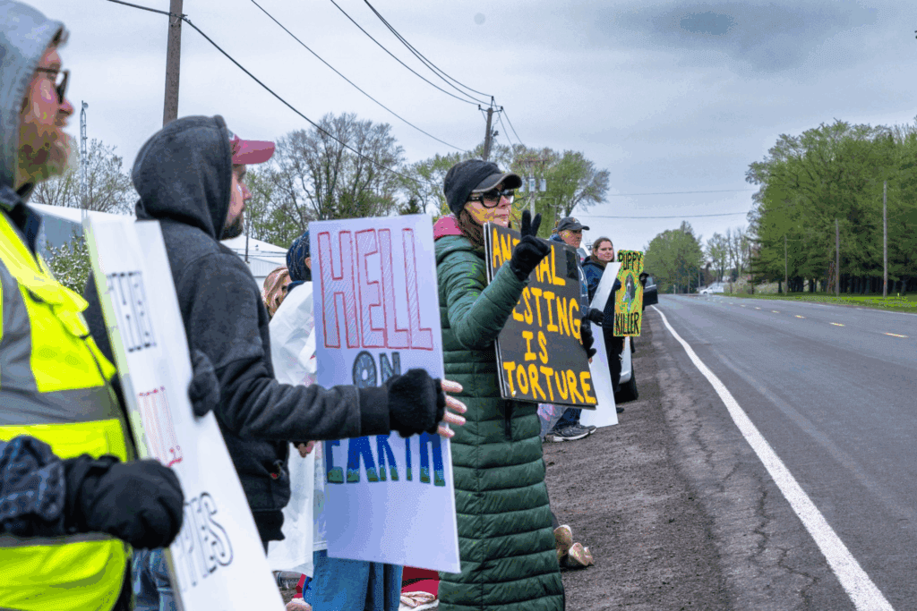 Protestors line up to end the breeding of testing lab beagle inside Marshall BioResources in North Rose, Wayne County, New York.